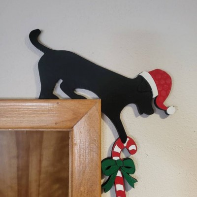 Hund mit Weihnachts-Zuckerstange Tür Ecke Zeichen Urlaub Dekoration