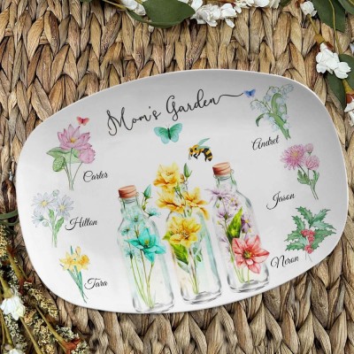Plateau de fleurs de naissance personnalisé dans le jardin de maman, avec nom d'enfant, idées cadeaux de noël en famille